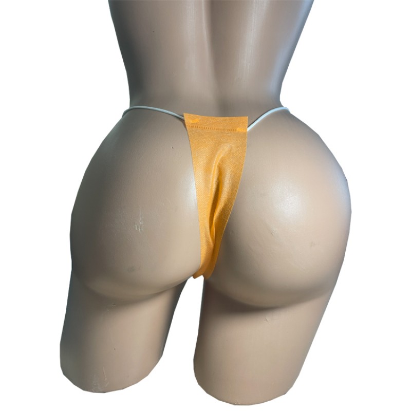 Трусики-стрінги, спанбонд, розмір L/XL, помаранчевий (50 шт.)