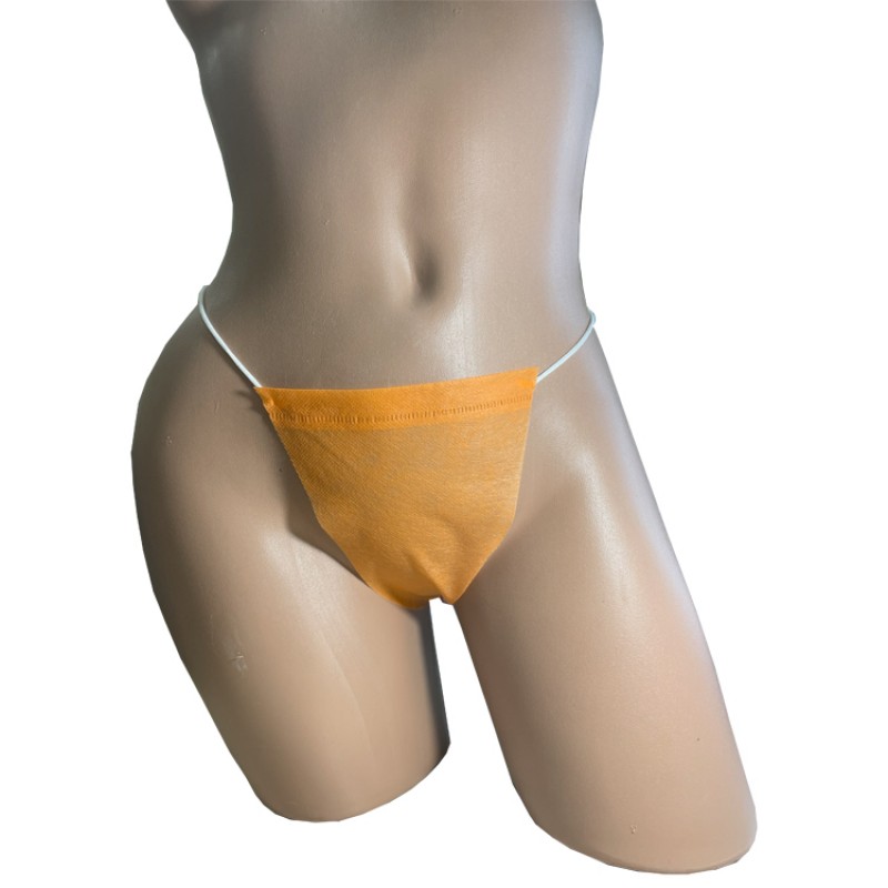 Трусики-стрінги, спанбонд, розмір L/XL, помаранчевий (50 шт.)